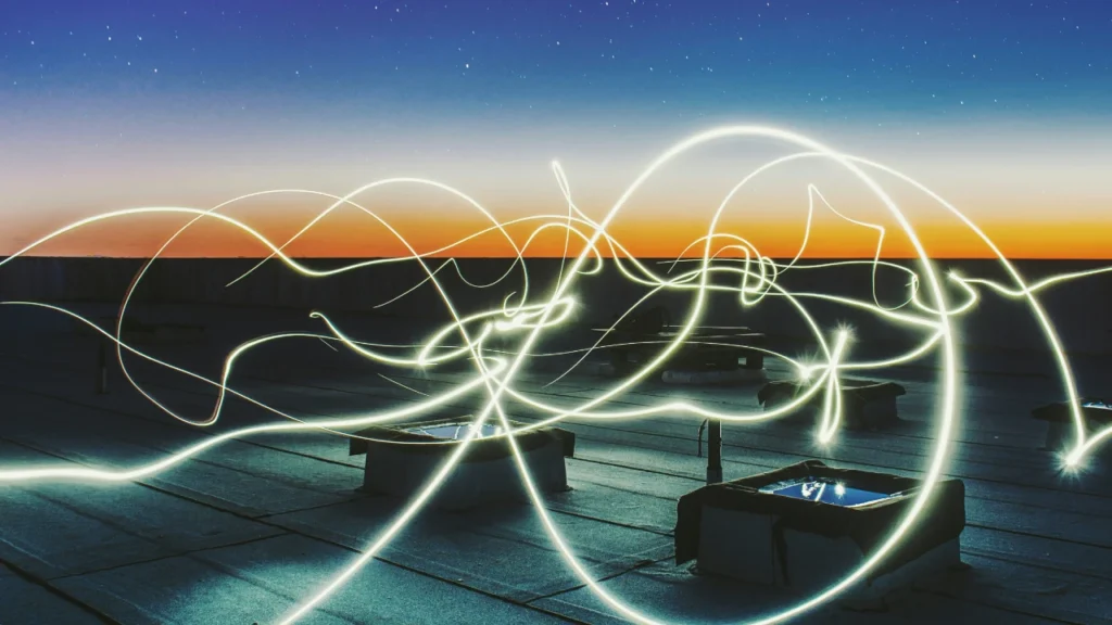 light trails on rooftop at sunset; representing fast analysis