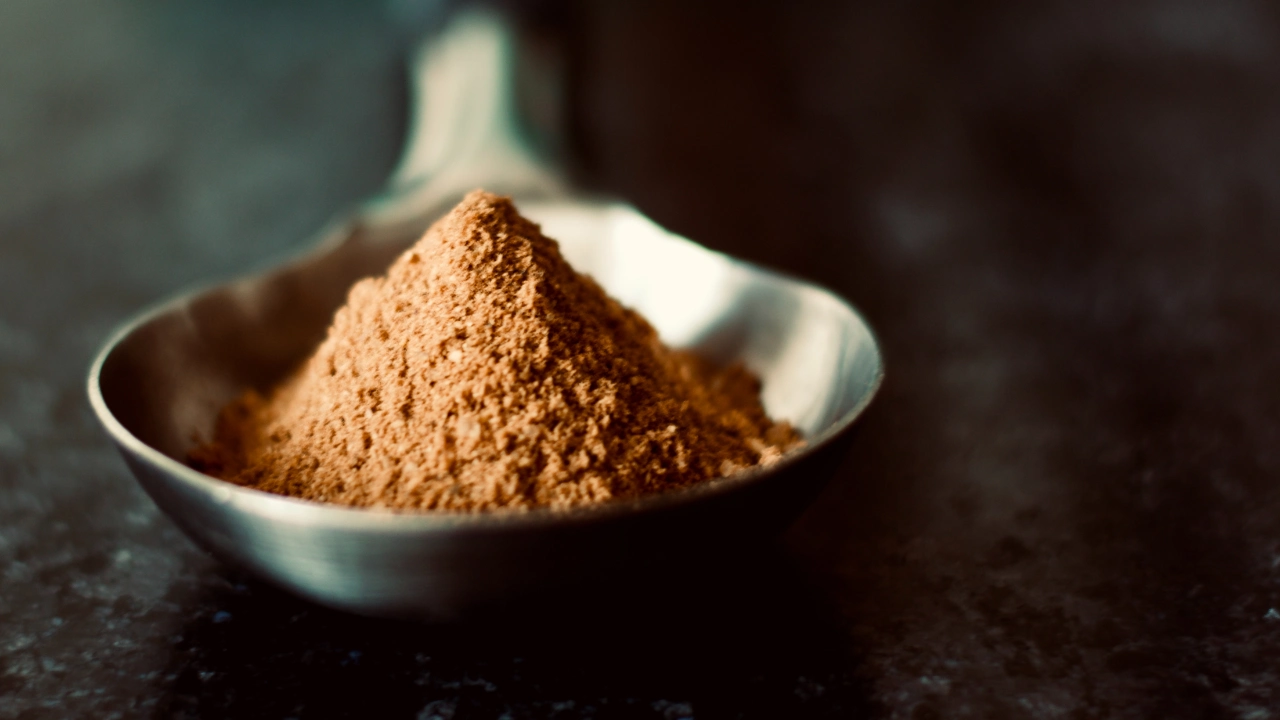 protein powder in a spoon