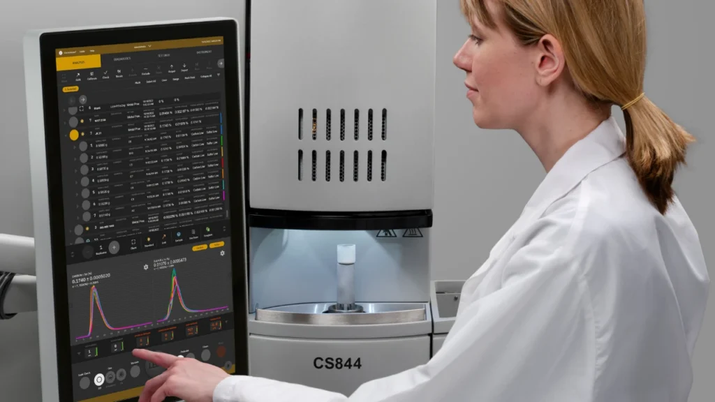 Scientist operating LECO CS844 elemental analyzer