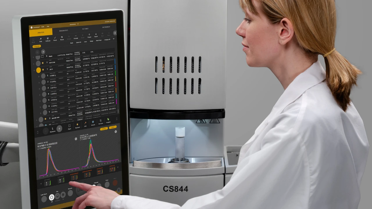 Scientist operating LECO CS844 elemental analyzer