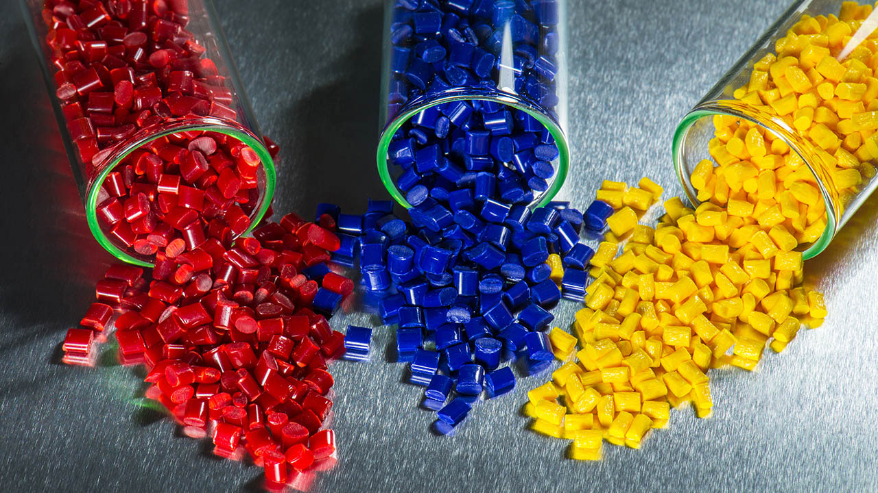 Polymer Granulates spilling out of test-tubes