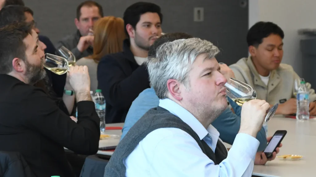 Chemistry of Wine participants tasting white wine