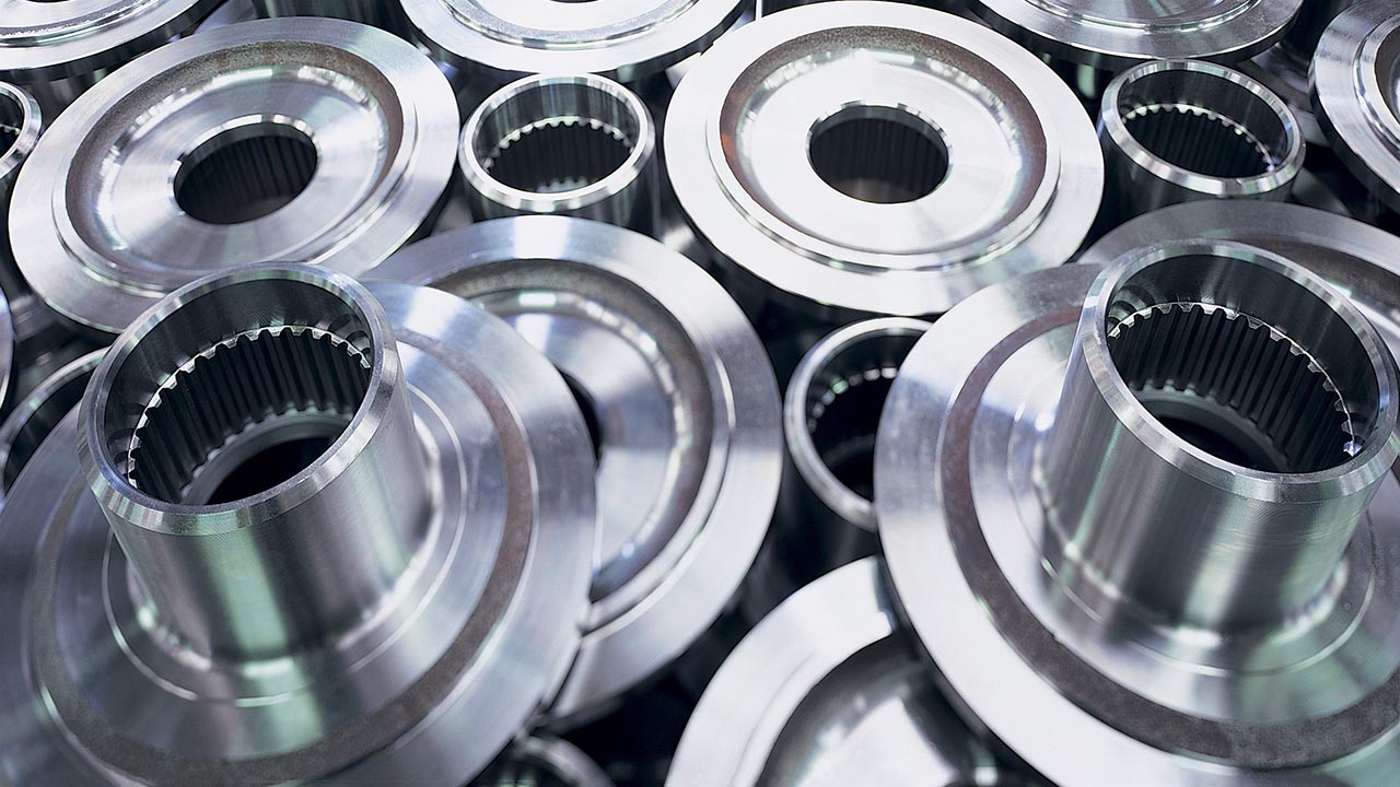 round metallic parts with gear insets